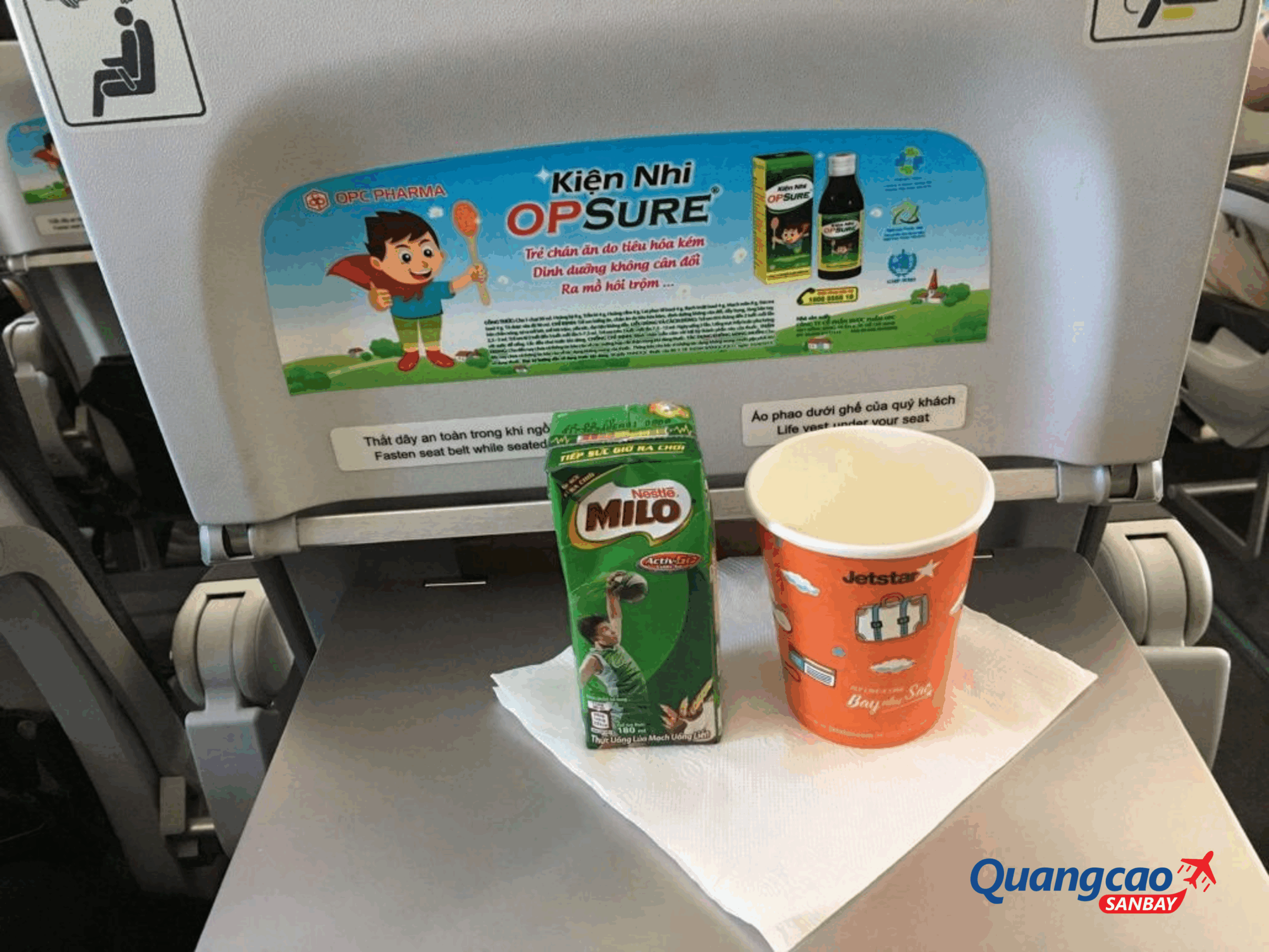 Tray table back advertising on board